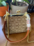 Co@ch coin bag